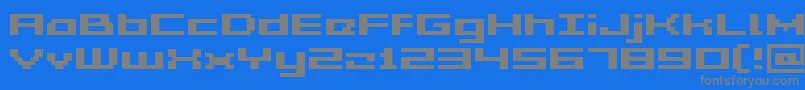 Fonte GrixelAcme5WideBold – fontes cinzas em um fundo azul
