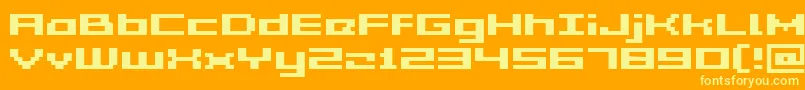 GrixelAcme5WideBold-fontti – keltaiset fontit oranssilla taustalla