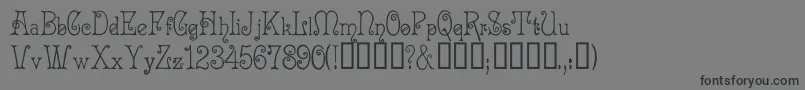 フォントAcadianc – 黒い文字の灰色の背景
