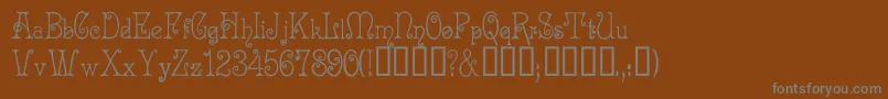 Acadianc Font – Gray Fonts on Brown Background