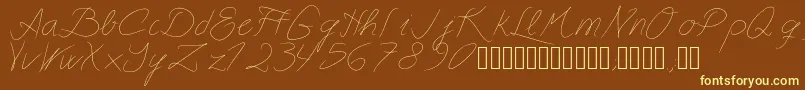 Astralasia-fontti – keltaiset fontit ruskealla taustalla