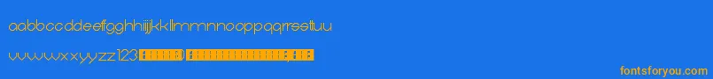 フォントDigitalis – オレンジ色の文字が青い背景にあります。