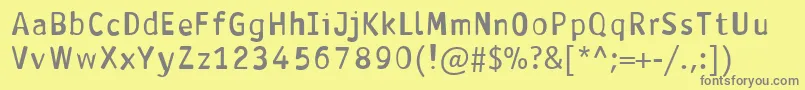 フォントAntavianaBold – 黄色の背景に灰色の文字