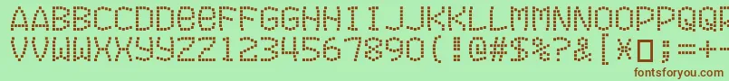 フォントExitfontforafilm – 緑の背景に茶色のフォント