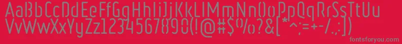 RulerStencilRegular-fontti – harmaat kirjasimet punaisella taustalla