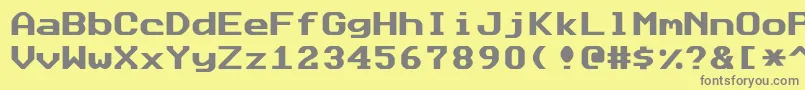 フォントDatasunfixed – 黄色の背景に灰色の文字