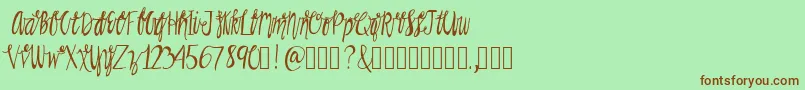 Rainman Font – Brown Fonts on Green Background