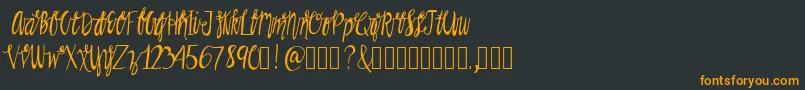 Rainman Font – Orange Fonts on Black Background