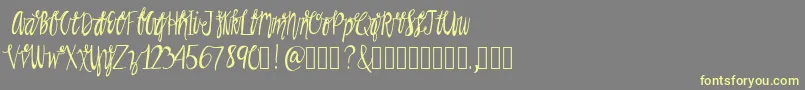 Rainman Font – Yellow Fonts on Gray Background