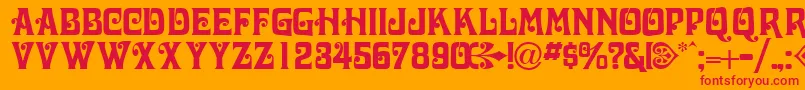 VolutecapssskRegular-Schriftart – Rote Schriften auf orangefarbenem Hintergrund