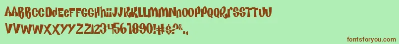 KenanKel Font – Brown Fonts on Green Background