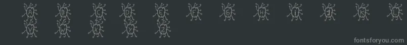 フォントVirus – 黒い背景に灰色の文字