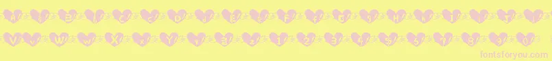 Fonte Heart Font – fontes rosa em um fundo amarelo