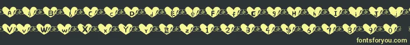 Heart Font Font – Yellow Fonts on Black Background