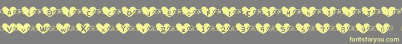 Heart Font Font – Yellow Fonts on Gray Background