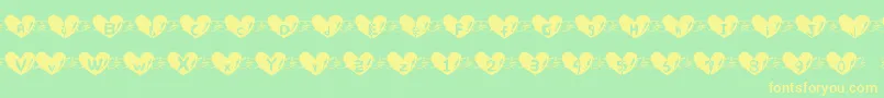 Heart Font Font – Yellow Fonts on Green Background