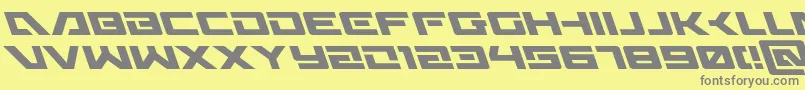 Wildcard31left-fontti – harmaat kirjasimet keltaisella taustalla