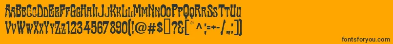 TraktirModern-Schriftart – Schwarze Schriften auf orangefarbenem Hintergrund
