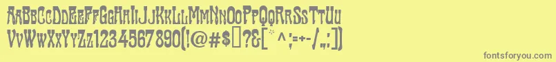 フォントTraktirModern – 黄色の背景に灰色の文字