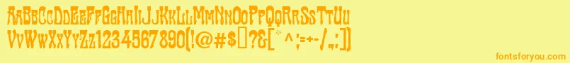 フォントTraktirModern – オレンジの文字が黄色の背景にあります。