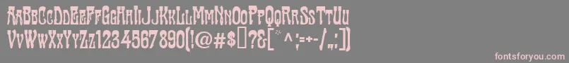 TraktirModern-fontti – vaaleanpunaiset fontit harmaalla taustalla