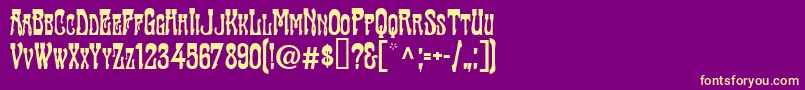フォントTraktirModern – 紫の背景に黄色のフォント