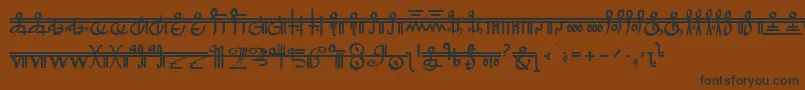 フォントCrystalBearers – 黒い文字が茶色の背景にあります