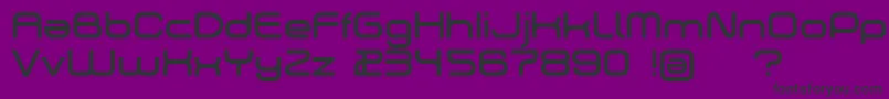 Dekers-fontti – mustat fontit violetilla taustalla