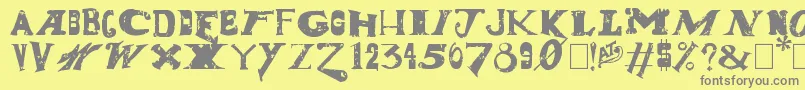 フォントDudeRanch – 黄色の背景に灰色の文字