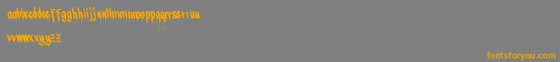 Chizel Font – Orange Fonts on Gray Background