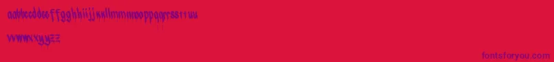 Czcionka Chizel – fioletowe czcionki na czerwonym tle