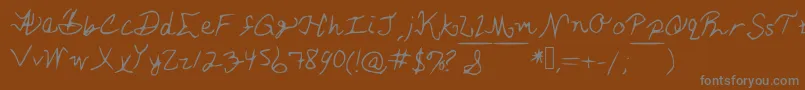 AshleySFont-Schriftart – Graue Schriften auf braunem Hintergrund