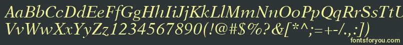 フォントNewAsterLtItalic – 黒い背景に黄色の文字