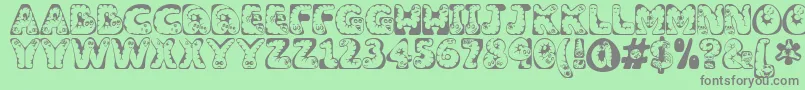 Wiggles Font – Gray Fonts on Green Background