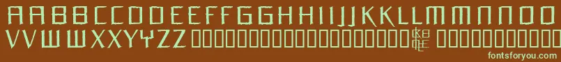 フォントOrchm – 緑色の文字が茶色の背景にあります。
