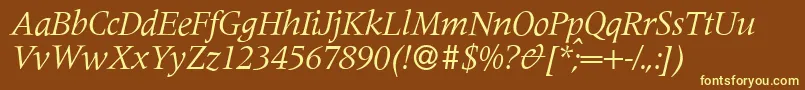 フォントM690RomanItalic – 黄色のフォント、茶色の背景