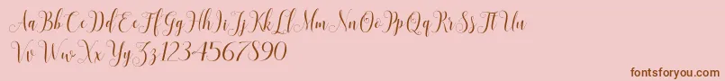 SadhiraScriptDemo-Schriftart – Braune Schriften auf rosa Hintergrund