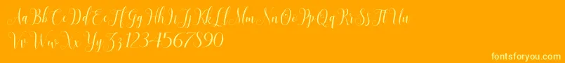 SadhiraScriptDemo-Schriftart – Gelbe Schriften auf orangefarbenem Hintergrund