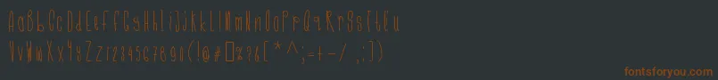 Шрифт Cmonkeeregular – коричневые шрифты на чёрном фоне