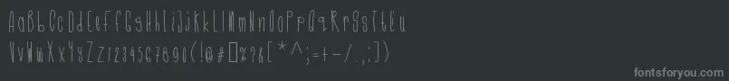Fonte Cmonkeeregular – fontes cinzas em um fundo preto