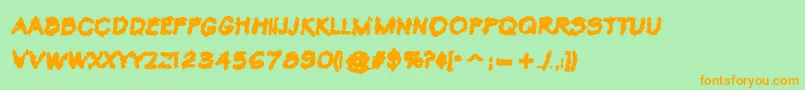フォントVtcKrinkleKutBold – オレンジの文字が緑の背景にあります。