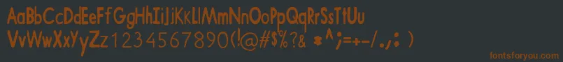 ShaunTheSheep Font – Brown Fonts on Black Background