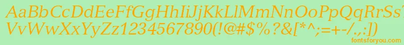 フォントVersaillesltstdItalic – オレンジの文字が緑の背景にあります。