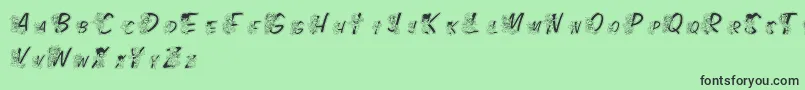 Fonte LmsColorKidsOutlined – fontes pretas em um fundo verde