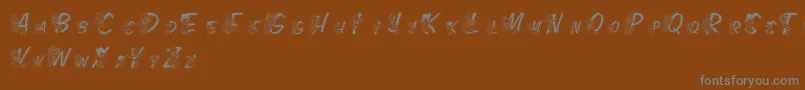 フォントLmsColorKidsOutlined – 茶色の背景に灰色の文字