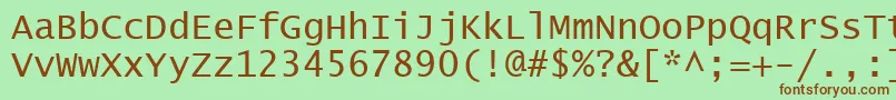 Czcionka Lucon – brązowe czcionki na zielonym tle