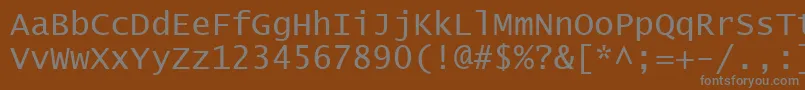 フォントLucon – 茶色の背景に灰色の文字