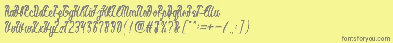 フォントBlackStallionBold – 黄色の背景に灰色の文字