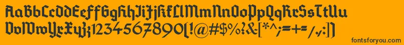 DeutschGotisch-Schriftart – Schwarze Schriften auf orangefarbenem Hintergrund