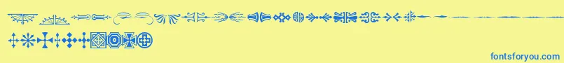 AdobeWoodTypeOrnamentsOne-fontti – siniset fontit keltaisella taustalla